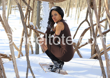 Model styled for snow on surface in                          setting with snow as hair accessory                           heeltote.com